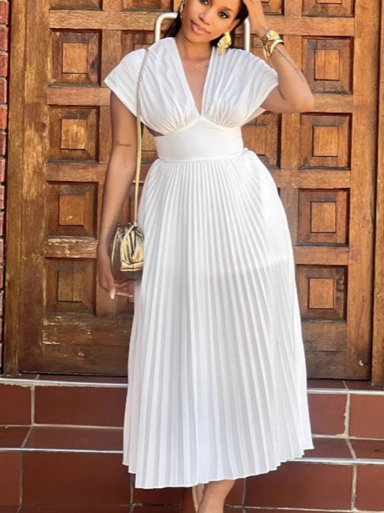 Vestido midi plisado con manga casquillo